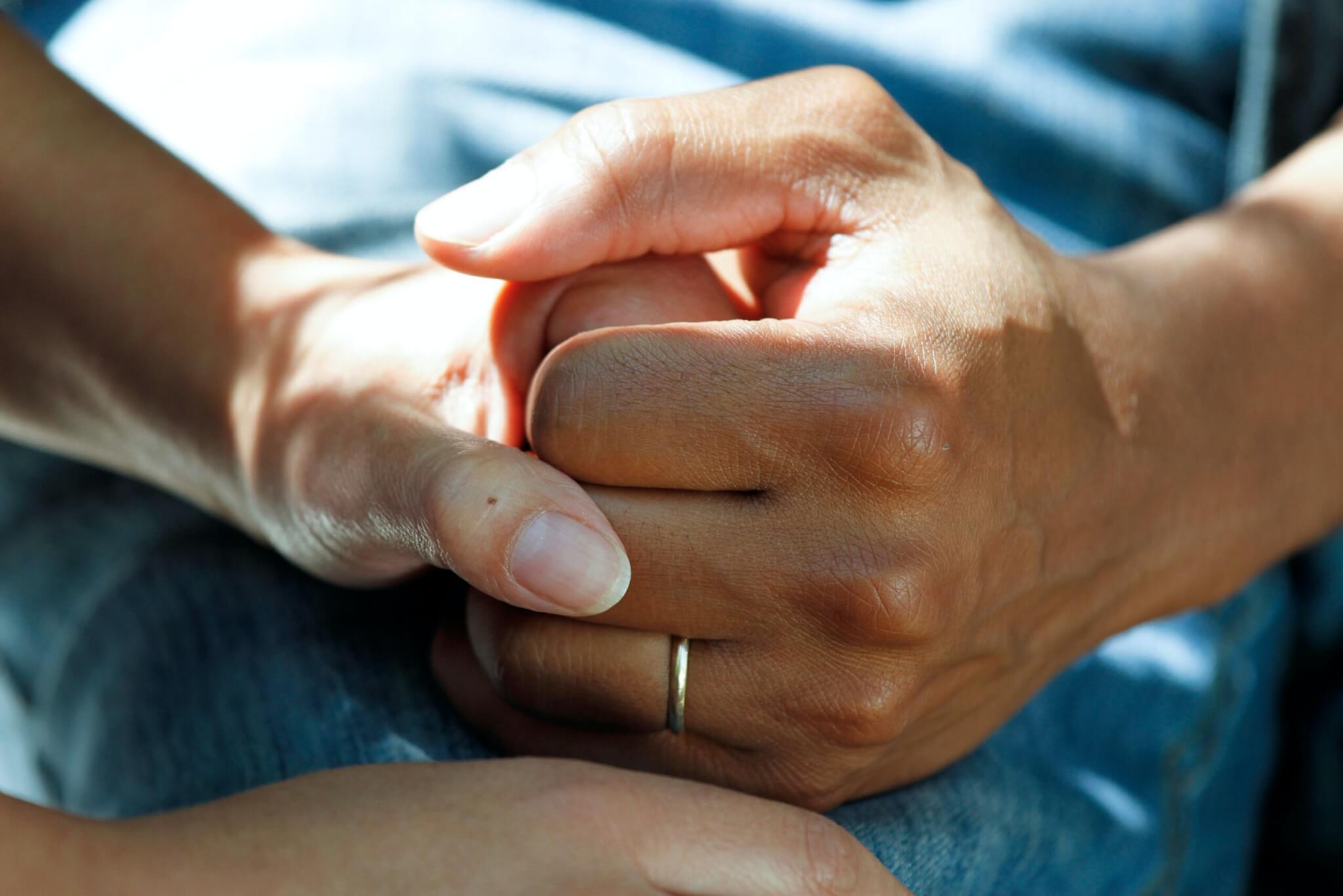 A couple holding hands